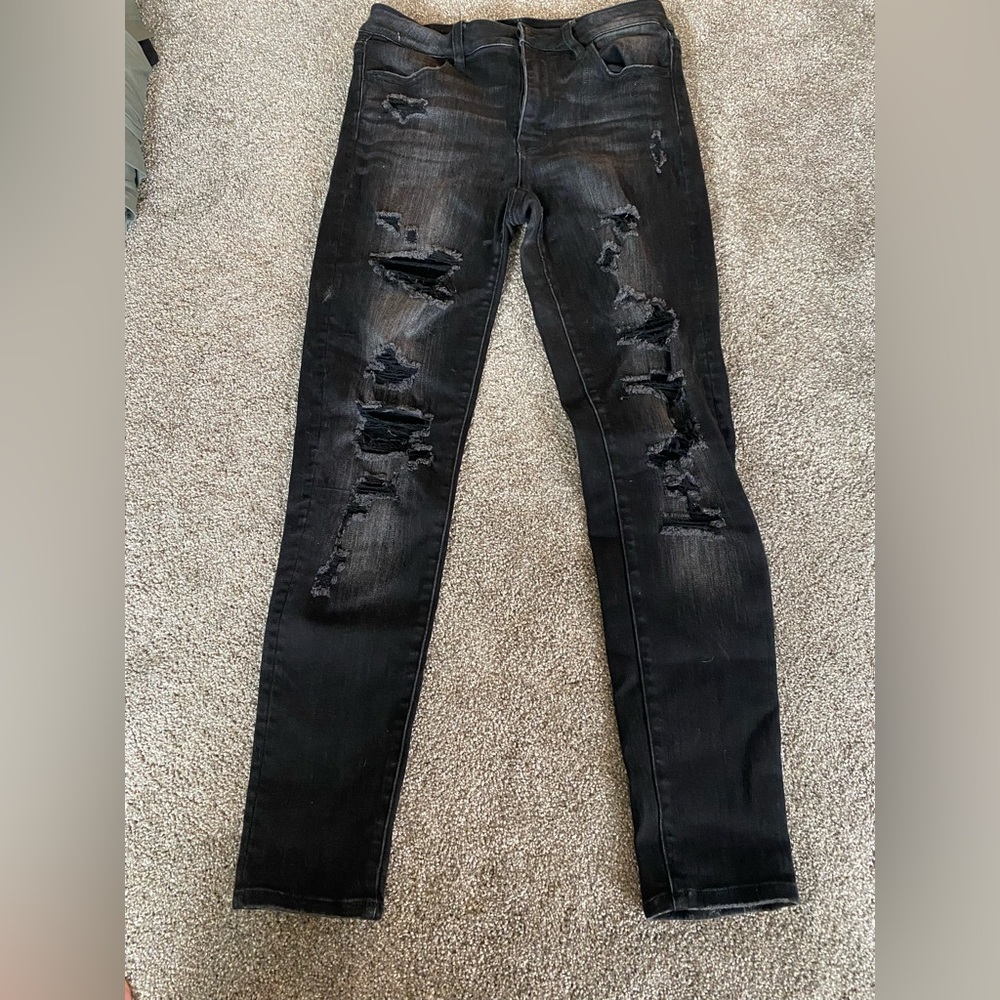 Black American Eagle skinny jeans with rips size 8